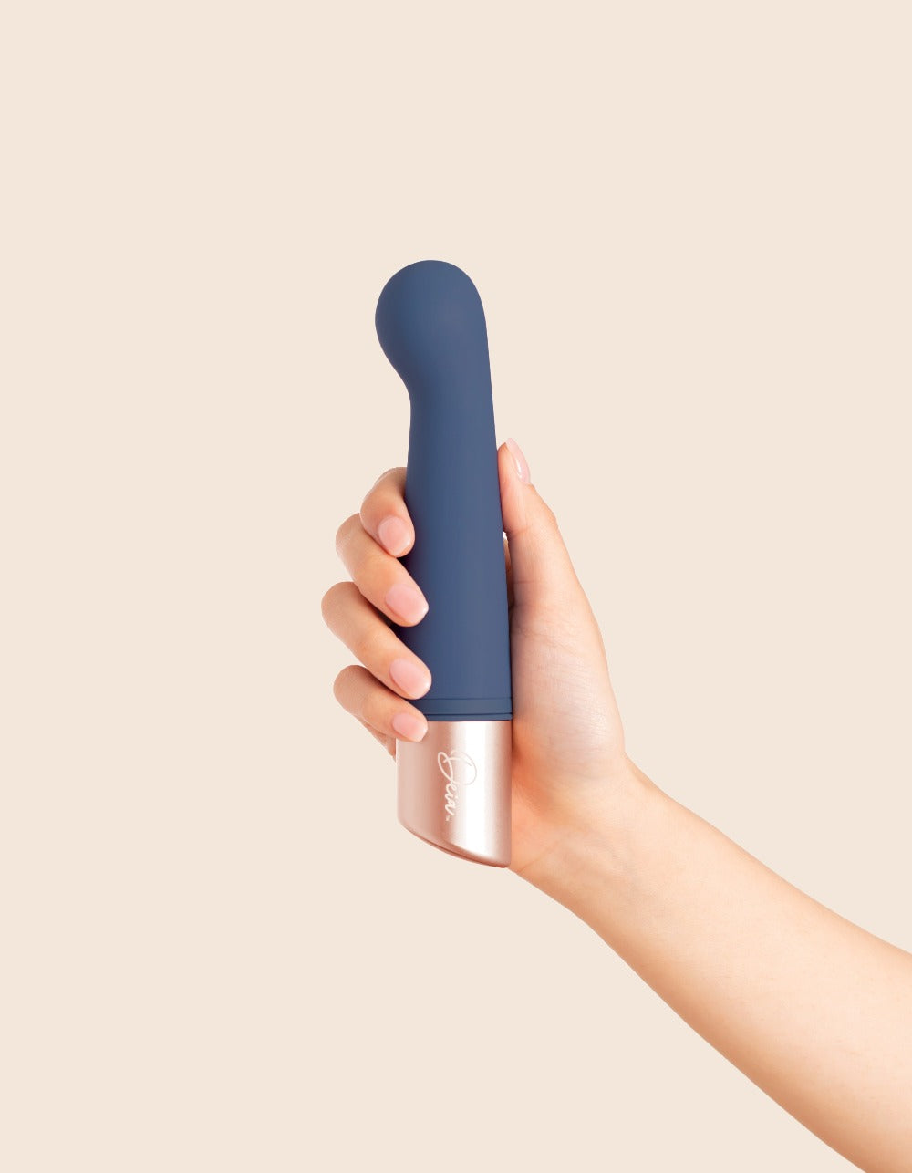 The Couple by Deia two-in-one vibrator being held upright in female hand