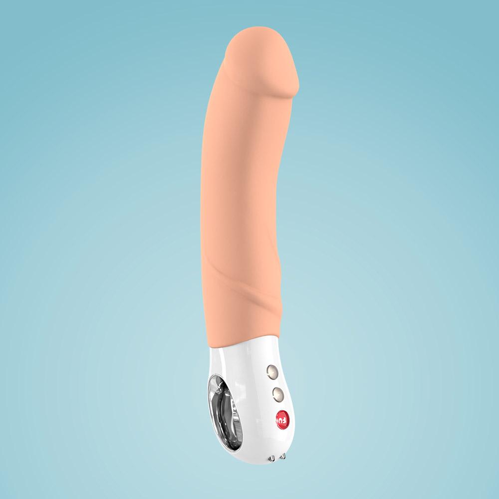 THE BIG BOSS: The Ultimate XL Vibrator by Fun Factory - skin tone on baby blue background
