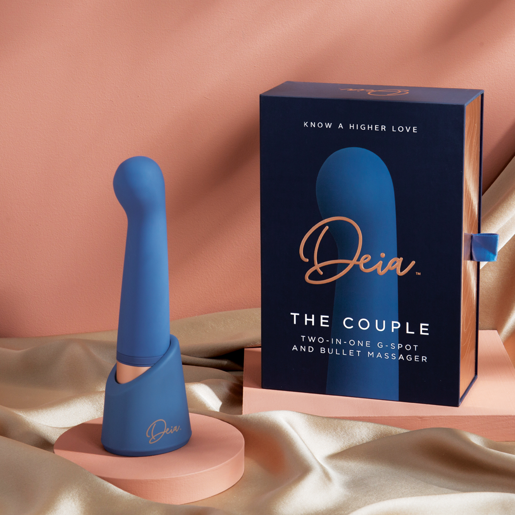 The Couple by Deia two-in-one g-spot massager-displayed with gift package and blue massager