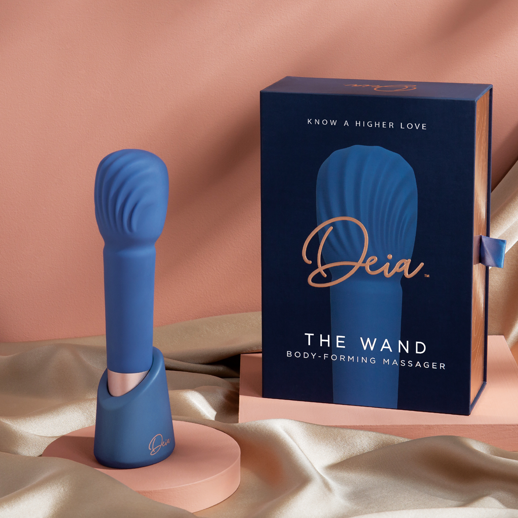 The Wand by Diea Periwinkle color massager-shown in a out of box presentation-includes the gift box