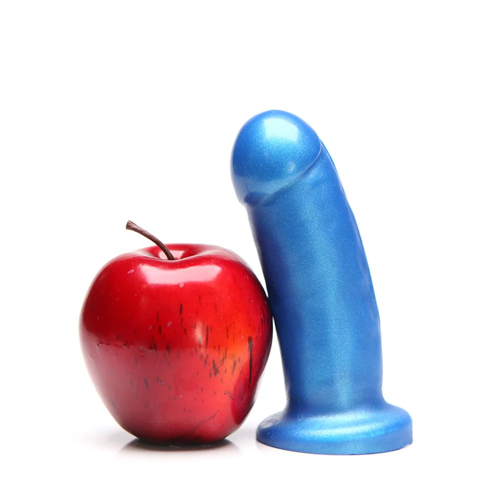 They / Them Azure Soft Dildo - shown next to a bright red apple for size comparison